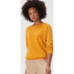 Gładka bluza basic - Żółty. Żółte bluzy damskie Sinsay, s, bez wzorów, bez rękawów, bez kaptura. W wyprzedaży za 23,99 zł.