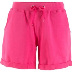 Szorty dresowe bonprix ciemnoróżowy. Różowe spodnie damskie bonprix, z dresówki. Za 49,99 zł.