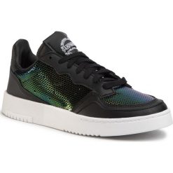 Buty adidas - Supercourt W EG2012 Cblack/Ftwwht/Mysrub. Czarne półbuty damskie Adidas, na co dzień, bez wzorów, ze skóry ekologicznej, bez obcasa, na płaskiej podeszwie, bez zapięcia. W wyprzedaży za 309,00 zł.