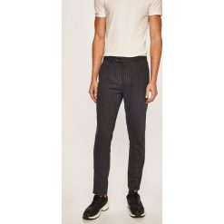 Scotch & Soda - Spodnie. Niebieskie spodnie męskie Scotch & Soda, na co dzień, bez wzorów, z elastanu, casualowe. W wyprzedaży za 339,90 zł.