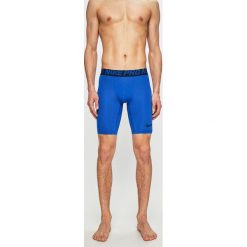 Nike - Szorty. Niebieskie spodenki sportowe męskie Nike, m, z nadrukiem, z elastanu, sportowe. W wyprzedaży za 89,90 zł.