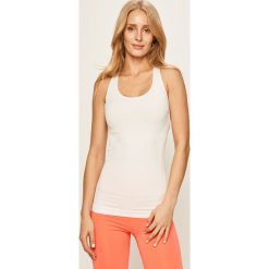 Hummel - Top. Żółte topy damskie Hummel, s, bez wzorów, z elastanu, bez rękawów. W wyprzedaży za 59,90 zł.