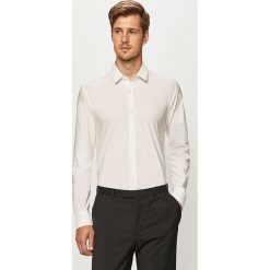 Hugo - Koszula. Niebieskie koszule męskie HUGO, bez wzorów, z elastanu, eleganckie, z klasycznym kołnierzykiem, z długim rękawem. Za 399,90 zł.