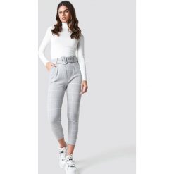 Trendyol Spodnie w kratkę - Grey. Szare spodnie z wysokim stanem Trendyol, w kratkę. Za 100,95 zł.