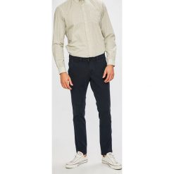 Camel Active - Spodnie Madison. Żółte spodnie męskie Camel Active, na co dzień, bez wzorów, z elastanu, casualowe. W wyprzedaży za 269,90 zł.