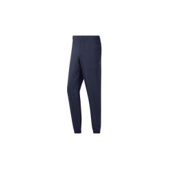 Spodnie treningowe Reebok Sport SPODNIE TE WVN C LINED. Czarne spodnie męskie Reebok Sport, s, bez wzorów, sportowe. Za 159,00 zł.