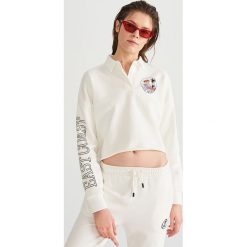 Bluza z kołnierzem - Kremowy. Białe bluzy damskie marki Reserved, s, bez wzorów, bez rękawów, bez kaptura. Za 79,99 zł.