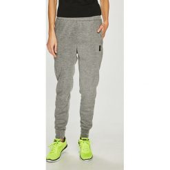 Reebok - Spodnie. Szare spodnie sportowe damskie marki Reebok, s, z poliesteru. Za 229,90 zł.