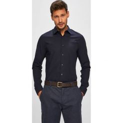Calvin Klein Jeans - Koszula J30J308056. Niebieskie koszule męskie Calvin Klein Jeans, s, bez wzorów, z elastanu, klasyczne, z klasycznym kołnierzykiem, z długim rękawem. W wyprzedaży za 219,90 zł.