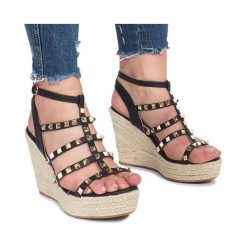 Czarne sandały na koturnie espadryle Mood. Czarne espadryle damskie ButyModne, w paski, rockowe, na wysokim obcasie, na koturnie, z paskami, trekkingowe. Za 69,00 zł.
