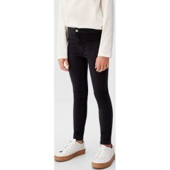 Mango Kids - Jeansy dziecięce Supersk 110-164 cm. Szare jeansy dziewczęce Mango Kids, bez wzorów, z elastanu. Za 69,90 zł.