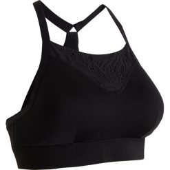 Stanik fitness cardio 120 czarny. Czarne buty sportowe damskie DOMYOS, w koronkowe wzory, z elastanu, na fitness i siłownię. Za 49,99 zł.