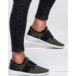 Zielone Buty Sportowe Reasonably. Zielone buty sportowe damskie Renee, bez wzorów, ze skóry, sportowe. Za 59,99 zł.