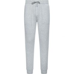Spodnie dresowe Calvin Klein Underwear 000NM1540E. Szare jeansy męskie Calvin Klein Underwear, m, bez wzorów, z jeansu. Za 249,00 zł.