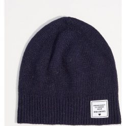 Czapka z wełną - Granatowy. Niebieskie czapki zimowe damskie Mohito, z wełny. Za 29,99 zł.