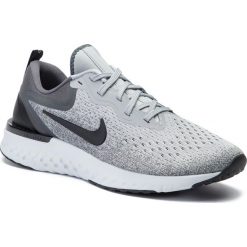 Buty NIKE - Odyssey React AO9820 003 Wolf Grey/Black/Dark/Grey. Szare buty sportowe damskie Nike, bez wzorów, z tworzywa sztucznego, sportowe, do biegania. W wyprzedaży za 469,00 zł.