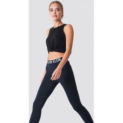 Calvin Klein Legginsy Waistband - Black. Czarne legginsy we wzory marki Calvin Klein. Za 283,95 zł.