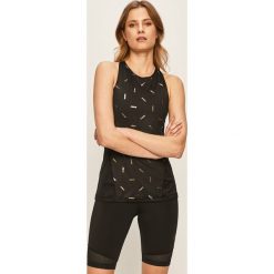 Nike - Top. Czarne topy damskie Nike, s, z nadrukiem, z elastanu, bez rękawów, dri-fit (nike). Za 129,90 zł.