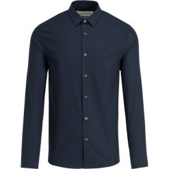Koszula Calvin Klein Jeans J30J312439. Białe koszule męskie Calvin Klein Jeans, m, bez wzorów, z jeansu, biznesowe, bez kołnierzyka, bez rękawów. W wyprzedaży za 189,00 zł.