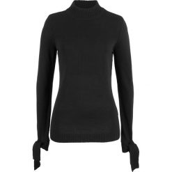 Sweter dzianinowy z ozdobnymi kokardkami, z bawełny z recyclingu bonprix czarny. Czarne swetry damskie bonprix, bez wzorów, z bawełny, bez rękawów, bez kaptura. Za 27,99 zł.