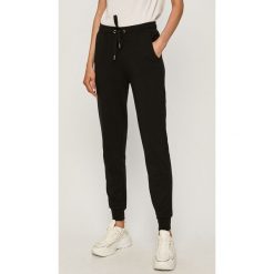 Trussardi Jeans - Spodnie. Czarne spodnie damskie Trussardi Jeans, s, z nadrukiem, z elastanu. Za 419,90 zł.