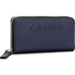 Portfele damskie: Duży Portfel Damski CALVIN KLEIN BLACK LABEL – Edge Large Ziparound K60K603910 430