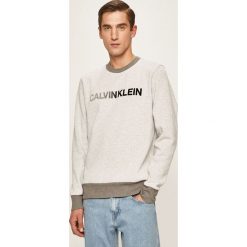 Calvin Klein - Sweter. Szare swetry męskie Calvin Klein, s, z aplikacjami, z bawełny, z okrągłym kołnierzem, bez kaptura. Za 449,90 zł.