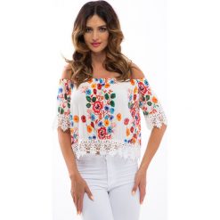 Kremowa bluzka w kwiaty TA8459. Białe bluzki damskie marki Fasardi, s, w kwiaty, bez kołnierzyka, bez rękawów. Za 47,20 zł.