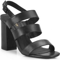 Buty damskie. Klapki damskie Wittchen, w paski, ze skóry, bez obcasa, na słupku. W wyprzedaży za 199,90 zł.