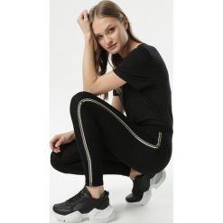 Czarne Legginsy Oceanelle. Czarne legginsy damskie Born2be, s, z napisami, z gumy. Za 39,99 zł.