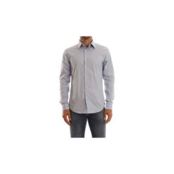 Koszule z długim rękawem G-Star Raw D03691 7085 CORE SHIRT. Niebieskie koszule męskie G-Star RAW, s, bez wzorów, retro, bez kołnierzyka, z długim rękawem. Za 213,46 zł.