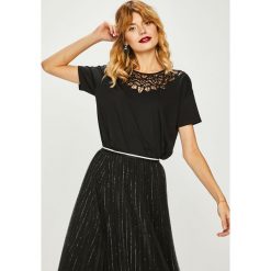 Medicine - Top Shimmering Fantasy. Czarne topy damskie marki MEDICINE, s, z bawełny, z okrągłym kołnierzem. W wyprzedaży za 29,90 zł.