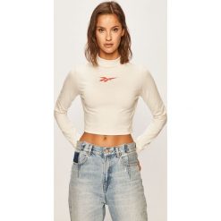 Reebok Classic - Longsleeve. Białe topy damskie Reebok Classic, s, z nadrukiem, z elastanu, casualowe, z golfem. W wyprzedaży za 99,90 zł.