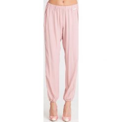 SPODNIE Twinset U&B. Różowe spodnie damskie Twinset U&B, s, z tkaniny. Za 305,00 zł.
