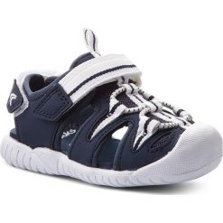 Sandały CLARKS - Rapid Tide 261313576 Navy. Niebieskie sandały chłopięce marki Clarks, ze skóry ekologicznej, bez zapięcia. W wyprzedaży za 129,00 zł.
