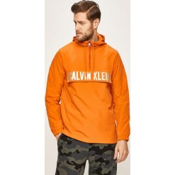 Calvin Klein Performance - Kurtka. Pomarańczowe płaszcze męskie Calvin Klein Performance, xl, bez wzorów, z tkaniny, krótkie, z kapturem. Za 539,90 zł.