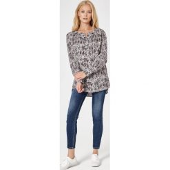 Koszula z przedłużanym tyłem - xl. Koszule damskie e-margeritka.pl, s, bez wzorów, z bawełny, eleganckie, bez kołnierzyka, bez rękawów. Za 174,99 zł.