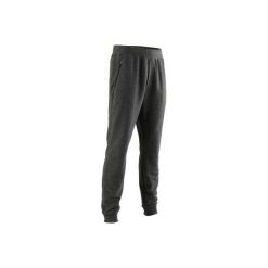 Spodnie dresowe slim Gym & Pilates 500 zip męskie. Szare spodnie męskie DOMYOS, s, bez wzorów, z elastanu. Za 59,99 zł.