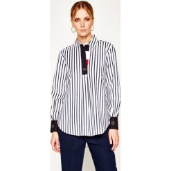 Bluzka TOMMY HILFIGER ICONS Icon WW0WW27505. Niebieskie bluzki damskie TOMMY HILFIGER, bez wzorów, z elastanu, bez kołnierzyka, bez rękawów. Za 579,00 zł.