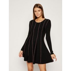 Sukienka dzianinowa Escada Sport Doja 5031090. Czarne sukienki damskie Escada Sport, xs, bez wzorów, z poliesteru, sportowe, bez kołnierzyka, bez rękawów, sportowe. W wyprzedaży za 699,00 zł.