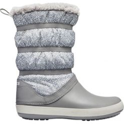 Crocs Damskie buty Winter Snow Crocband 205314-998 (rozmiar 36-37). Białe klapki damskie Crocs, bez wzorów, z gumy, bez obcasa. W wyprzedaży za 272,00 zł.