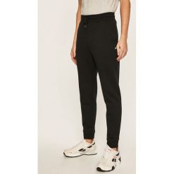Tommy Jeans - Spodnie. Niebieskie spodnie męskie Tommy Jeans, na co dzień, s, bez wzorów, z elastanu. W wyprzedaży za 319,90 zł.