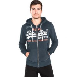 SuperDry Bluza Niebieski. Niebieskie bluzy męskie Superdry, m, z nadrukiem, z bawełny, bez kołnierzyka, bez rękawów, bez kaptura. Za 400,95 zł.