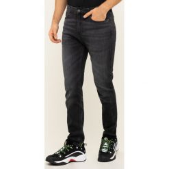 Jeansy Skinny Fit Tommy Jeans Simon DM0DM07353. Czarne jeansy męskie Tommy Jeans, m, bez wzorów, z elastanu. W wyprzedaży za 429,00 zł.