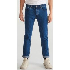 Spodnie jeansowe slim - Granatowy. Niebieskie spodnie męskie Reserved, m, bez wzorów, z jeansu. Za 129,99 zł.