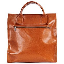 Teczka skórzana damska DAN-A T233 camel - camel. Brązowe aktówki damskie DAN-A, bez wzorów, ze skóry, eleganckie, bez dodatków. Za 279,99 zł.