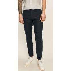 Guess Jeans - Spodnie. Niebieskie spodnie męskie Guess Jeans, m, z aplikacjami, z bawełny. Za 519,90 zł.