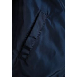 Levi's® TED Kurtka Bomber dress blues. Niebieskie kurtki męskie bomber marki Levi's®, s, z materiału. Za 339,00 zł.