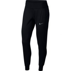 Spodnie do biegania damskie NIKE THERMAL PANT / 856153-010. Spodnie damskie Nike, bez wzorów, do biegania. Za 174,99 zł.