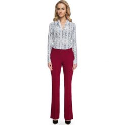 Julita spodnie z rozporkami przy nogawkach - bordowe. Czerwone spodnie damskie Stylove, xl, z elastanu. W wyprzedaży za 84,50 zł.